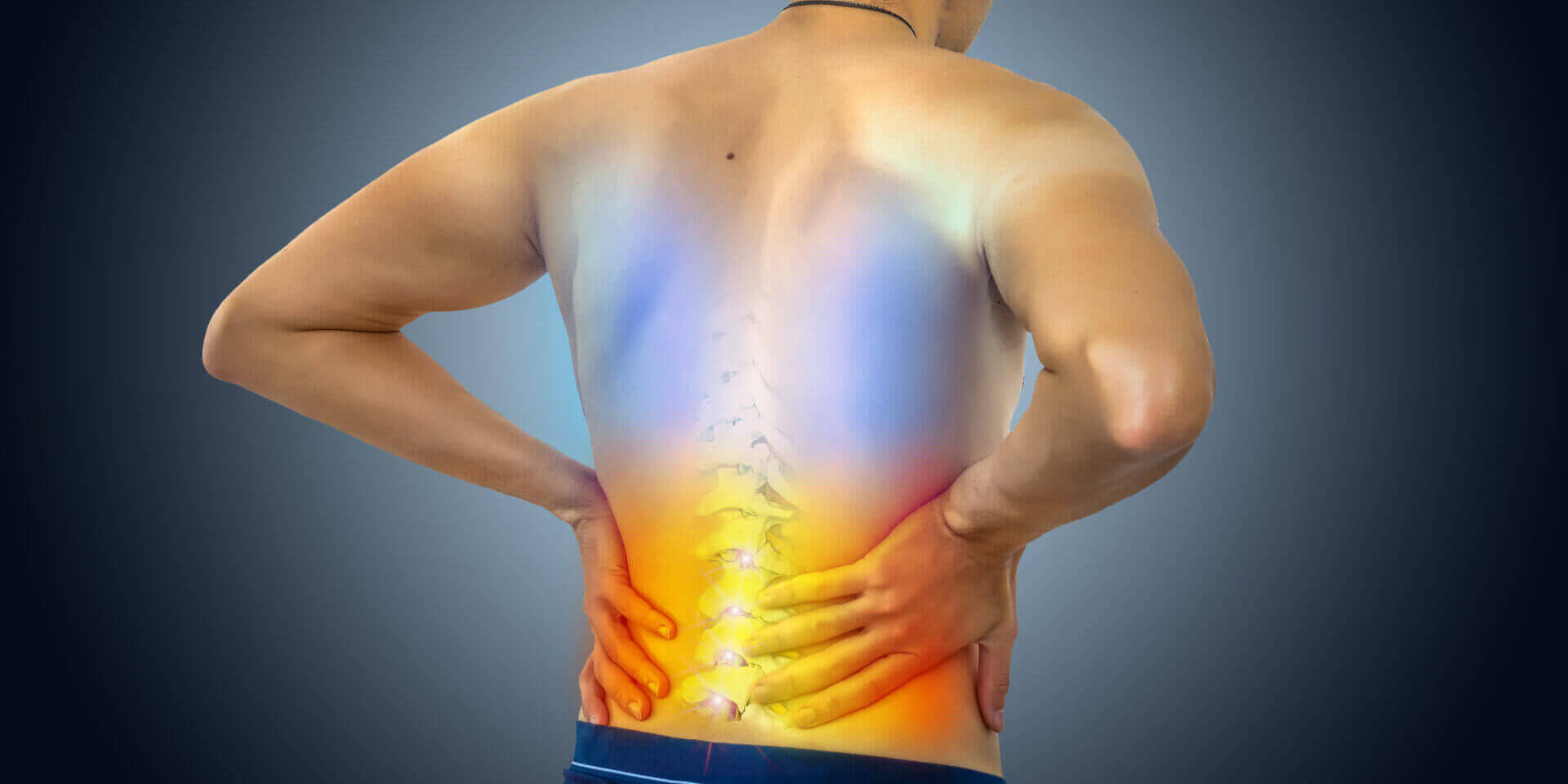 Lower Back Pain. Man Holding His Back In Pain. Medical Concept.